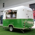 White Light Green Airstream Food Trailer
